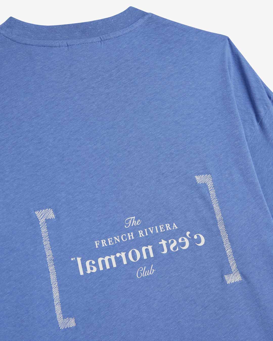 Le Linen T-Shirt in azure — featuring the French Riviera Club back graphic