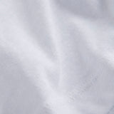 Le Linen T-Shirt in white — close-up of the textured linen-cotton jersey fabric