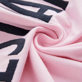 The c'est pari Oversized T-Shirt