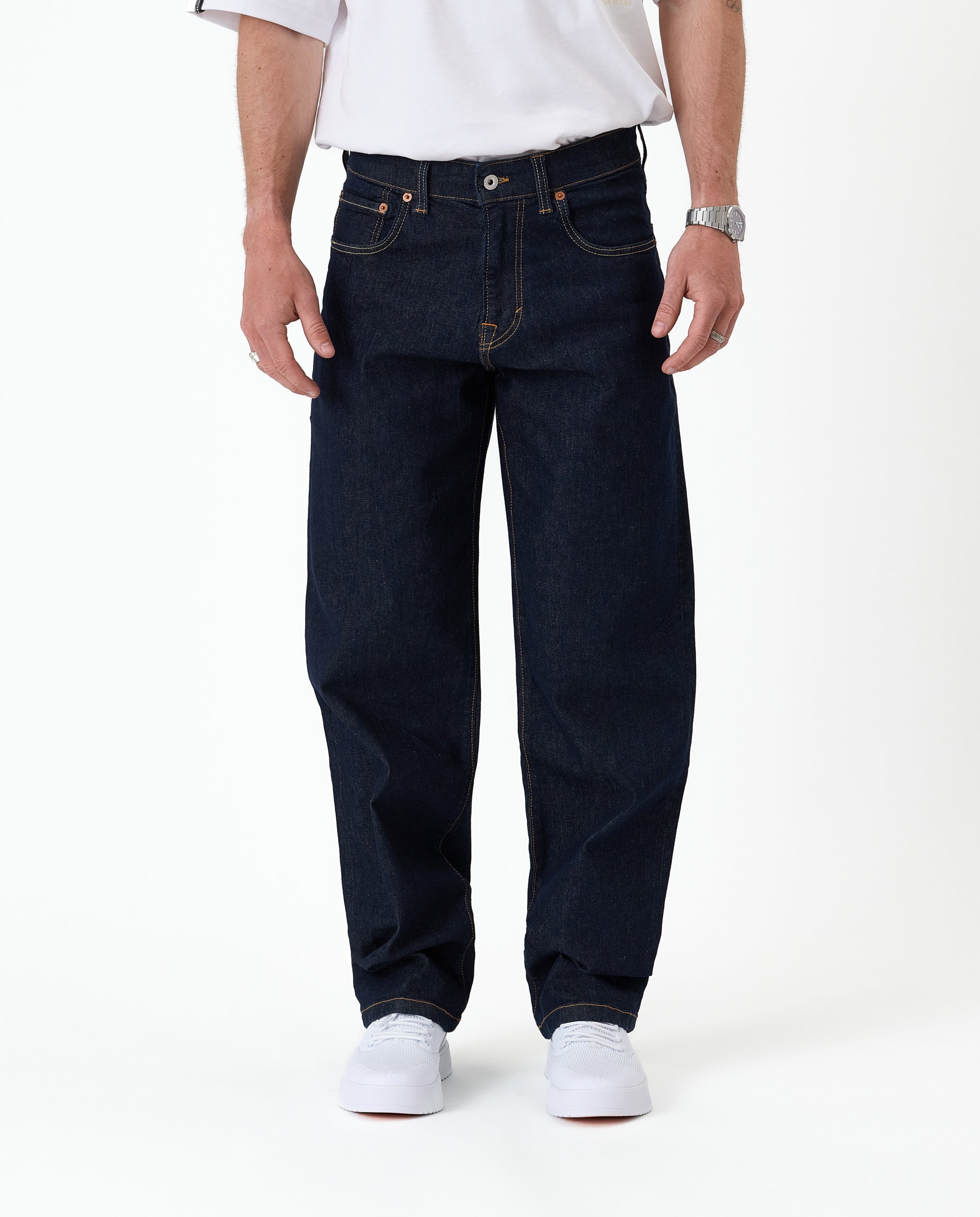 The Jeans Relaxed Straight Fit in rinse wash — front view against a white background