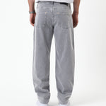 The Jeans Relaxed Straight Fit in light grey — back view showing pockets and rubber patch