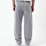 The Jeans Relaxed Straight Fit in light grey — back view showing pockets and rubber patch