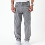 The Jeans Relaxed Straight Fit in light grey — front view worn with white sneakers