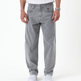The Jeans Relaxed Straight Fit in light grey — front view worn with white sneakers