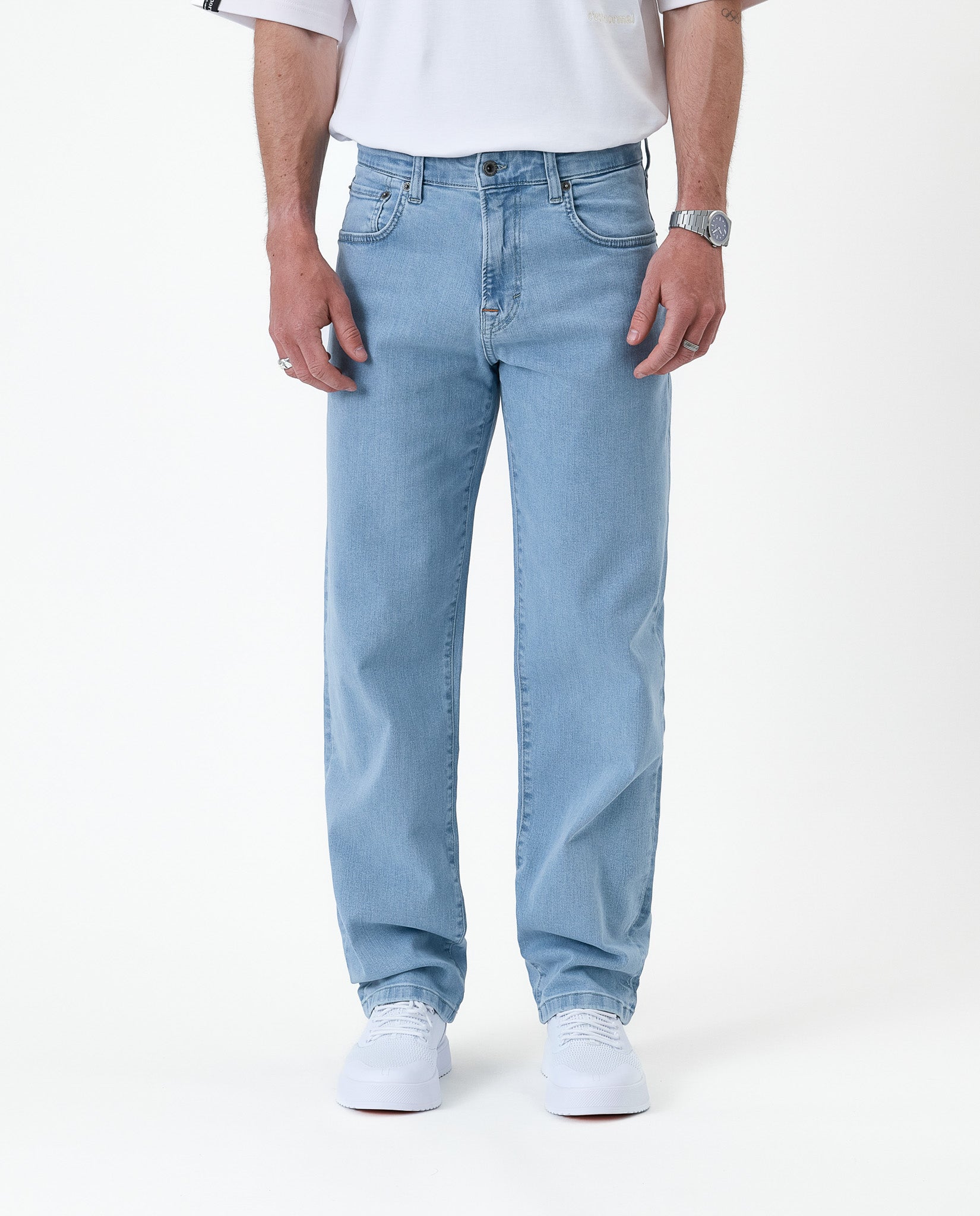 The Jeans Relaxed Straight Fit in light blue — front view showing the straight leg silhouette