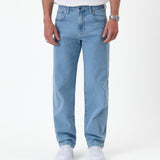 The Jeans Relaxed Straight Fit in light blue — front view worn with white sneakers