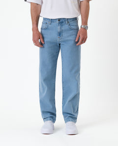 The Jeans Relaxed Straight Fit in light blue — front view worn with white sneakers