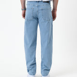 The Jeans Relaxed Straight Fit in light blue — back view with a white t-shirt