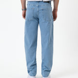 The Jeans Relaxed Straight Fit in Light Blue — back view showing the roomier straight leg