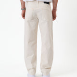 The Jeans Relaxed Straight Fit in ecru — back view against a white background