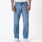 The Jeans Classic Straight Fit in light mid blue — front view worn with white sneakers