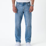 The Jeans Classic Straight Fit in light mid blue — front view worn with white sneakers