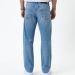 The Jeans Classic Straight Fit in light mid blue — back view showing the straight leg silhouette