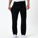 The Jeans Classic Straight Fit in jet black — showing the stretch of the denim fabric