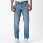 The Jeans Slim Fit in light midwash — front view against a white background