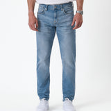The Jeans Slim Fit in light midwash — front view against a white background