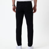 The Jeans Skinny Fit in jet black — back view showing the skinny silhouette