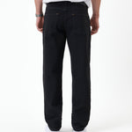 The Jeans Relaxed Straight Fit in Jet Black — back view showing the straight leg silhouette