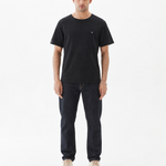 The Forever T-shirt in black — worn with dark denim jeans