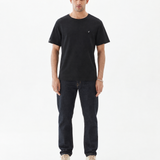 The Forever T-shirt in black — worn with dark denim jeans