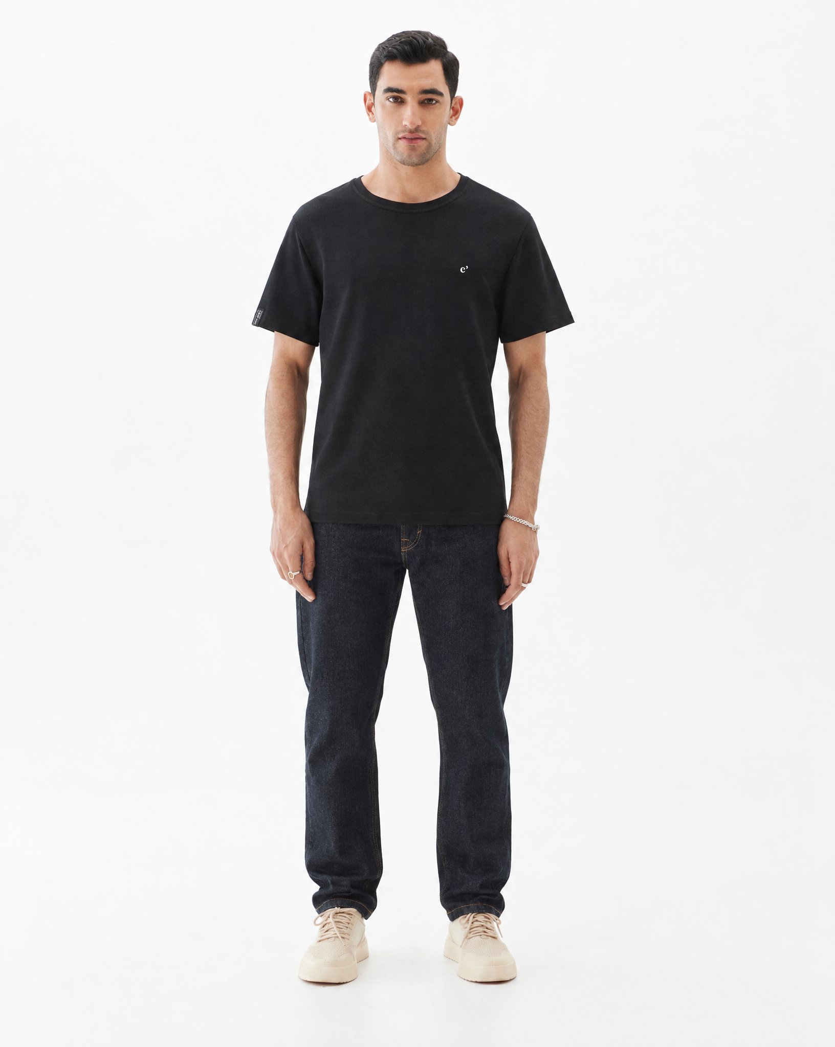 The Forever T-shirt in black — worn with dark denim jeans