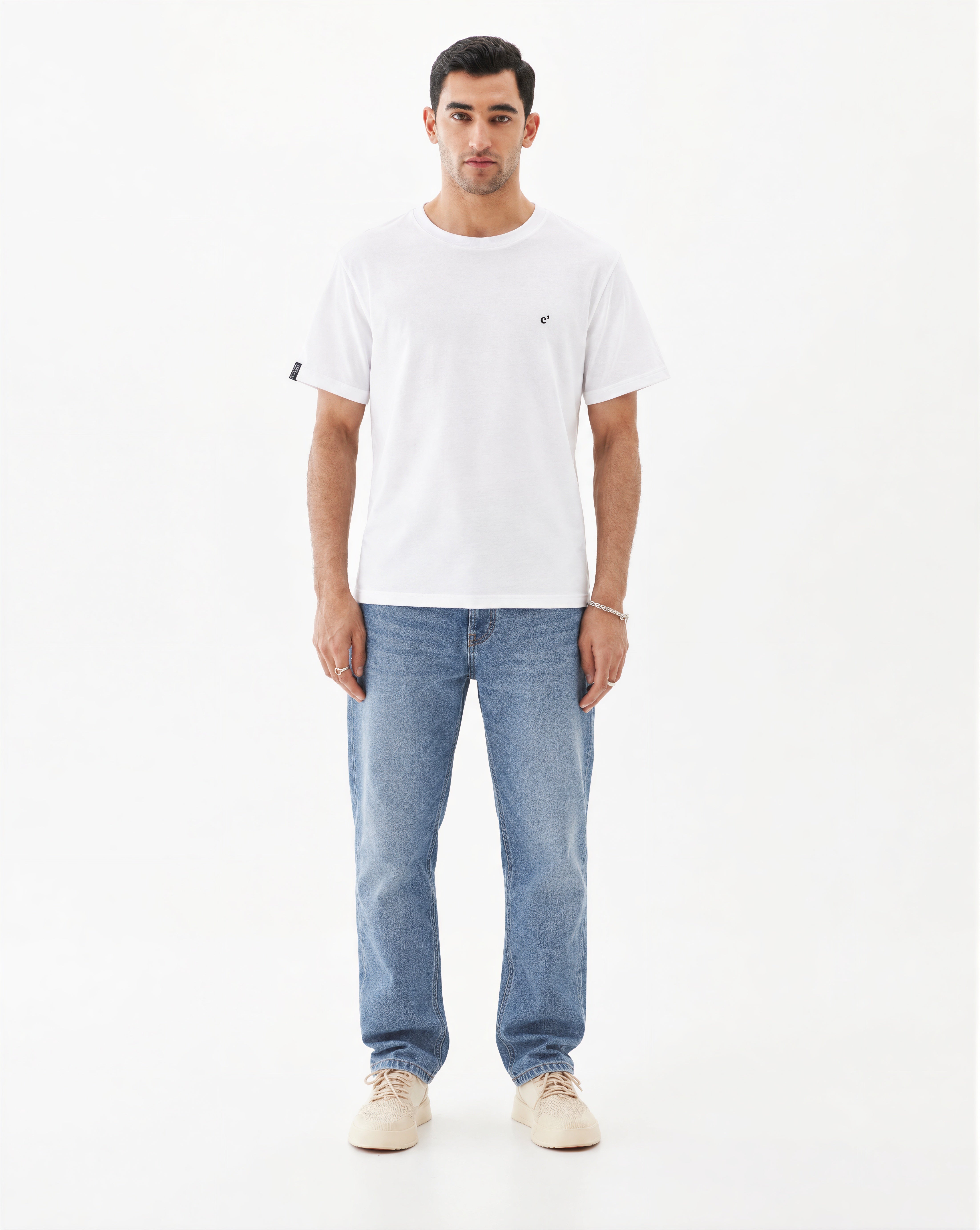 The Forever T-shirt in white — front view worn with blue jeans