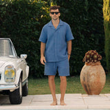 Le Waffle Resort Shirt in azure — paired with matching waffle shorts by a pool
