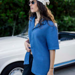 Le Waffle Resort Shirt in azure — worn with a white bandana and sunglasses next to a vintage car