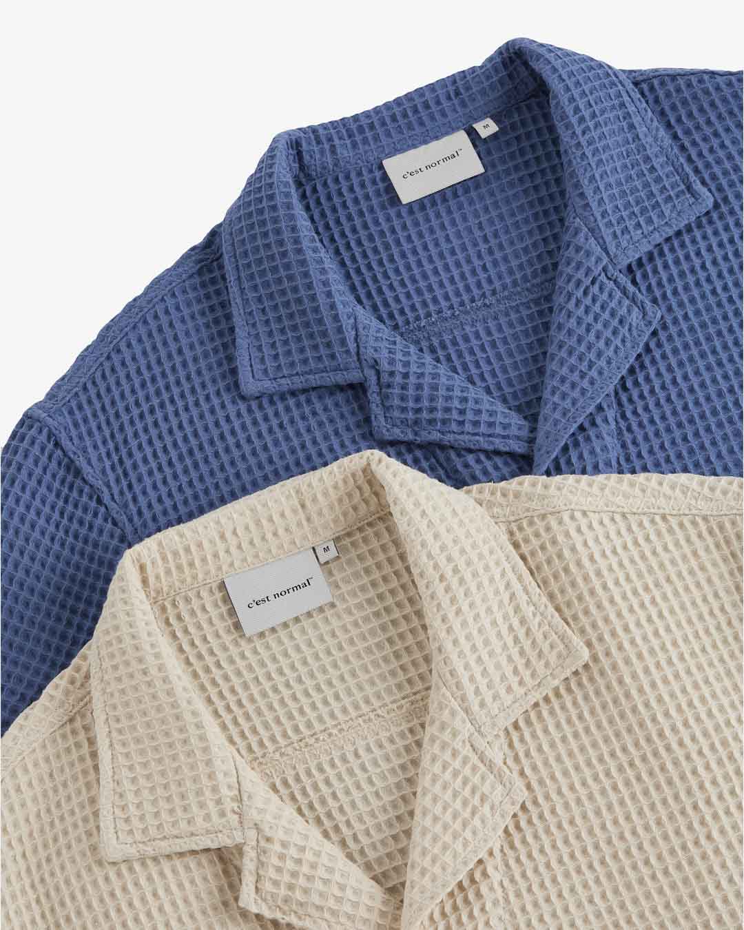 Le Waffle Resort Shirt in azure — close-up showing the waffle-woven texture and neck labels.