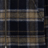 The Reversible Wool Jacket in plaid — close-up of zipper and pattern