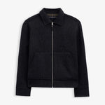 The Reversible Wool Jacket in dark grey — front view with a silver zipper