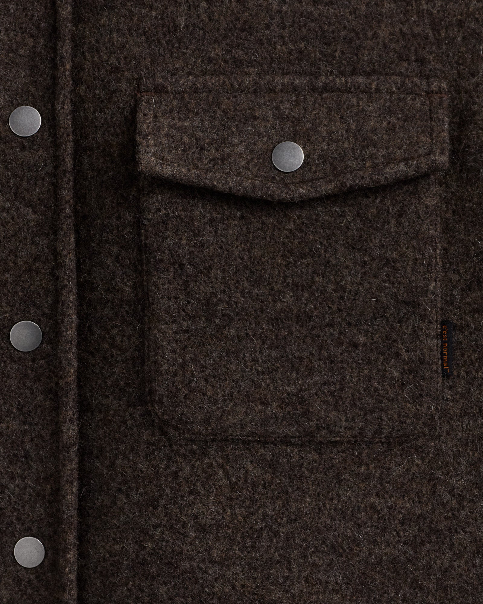 Stockholm Wool Shacket in brown melange — close-up of chest pocket and buttons