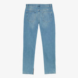 A back view of The Jeans Regular Fit in blue, laid flat on a white background. The image highlights the two back pockets, belt loops, and the classic denim wash.