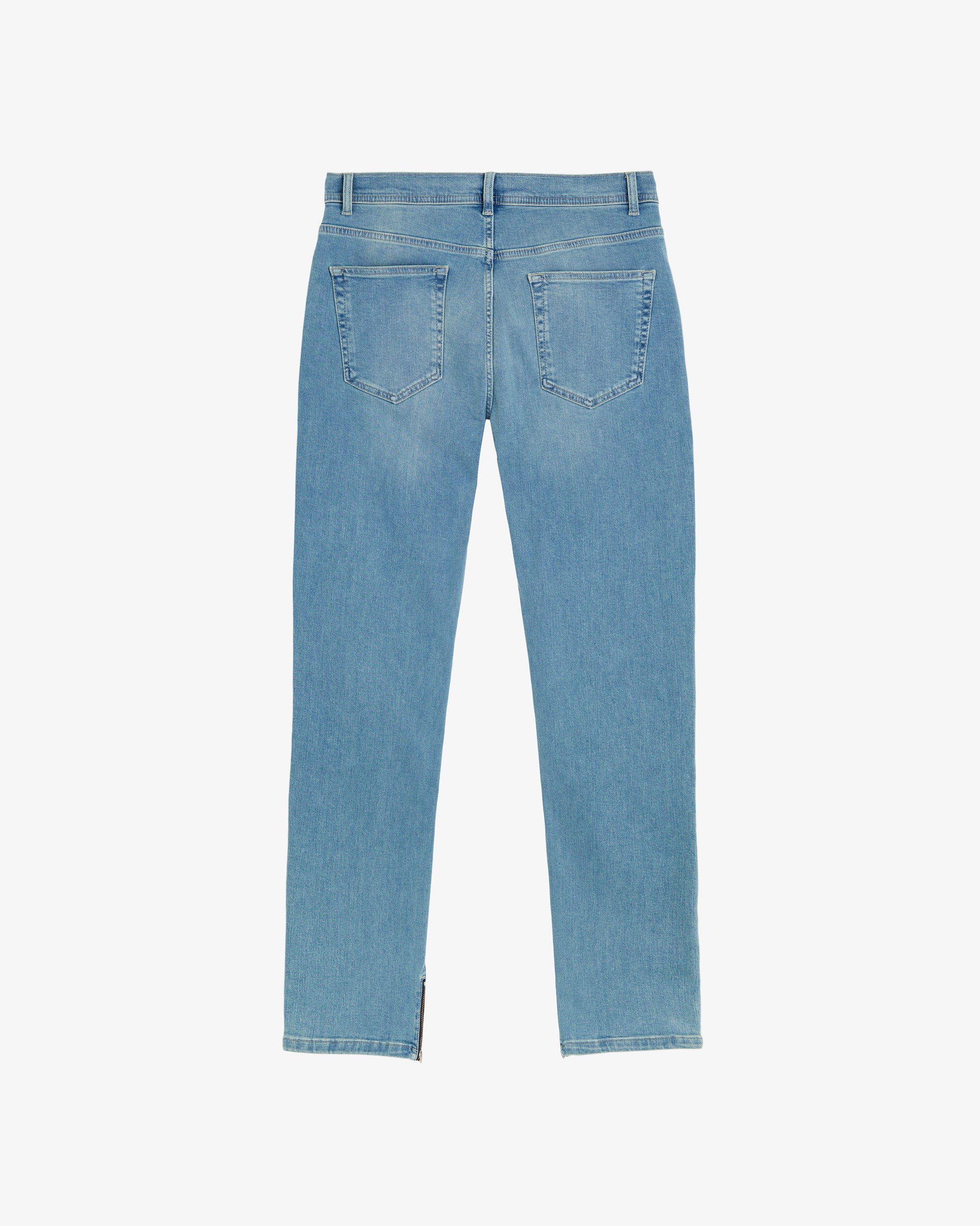 A back view of The Jeans Regular Fit in blue, laid flat on a white background. The image highlights the two back pockets, belt loops, and the classic denim wash.