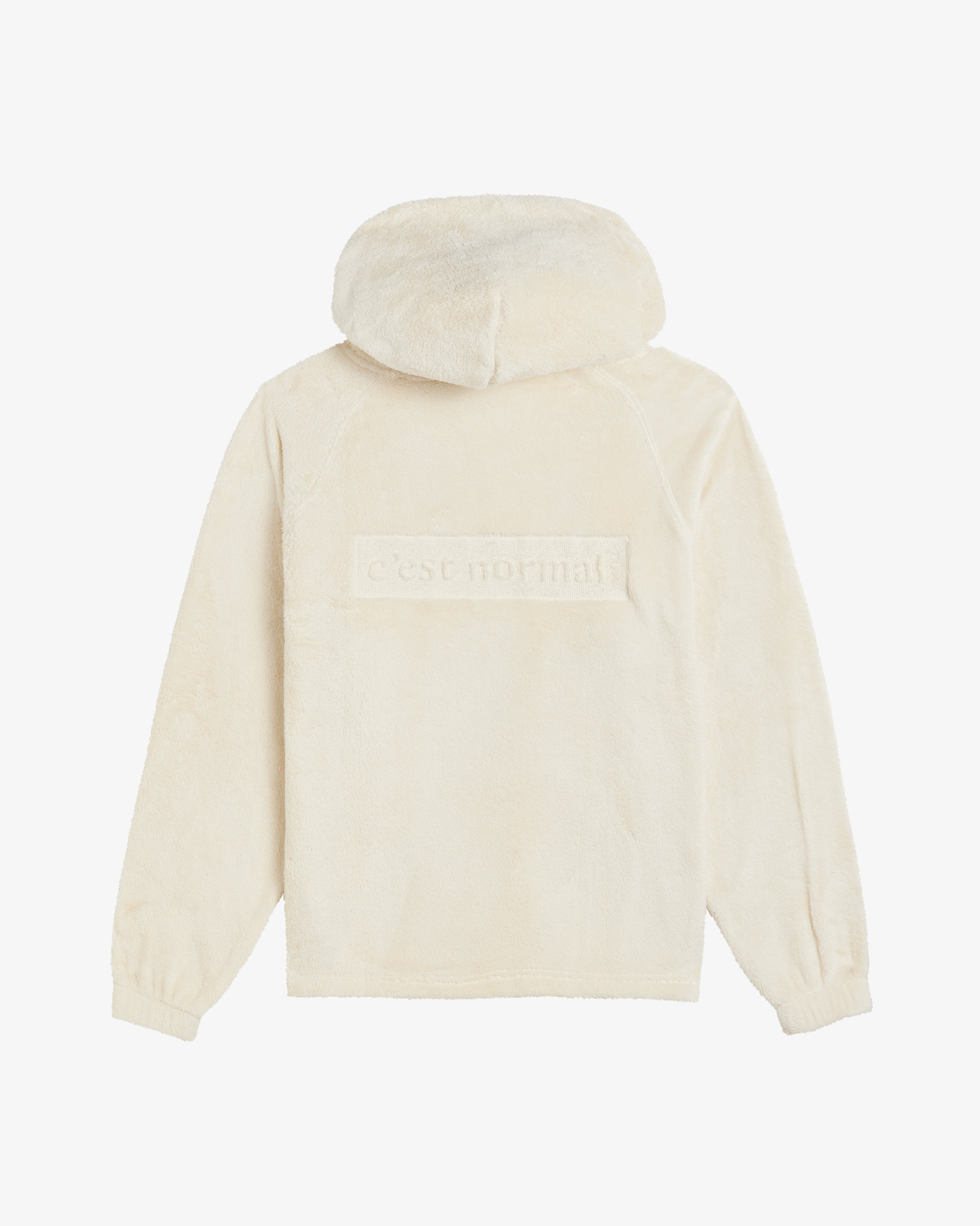 The Oversized Teddy Hoodie in cream — back view showing the embossed C'est normal logo