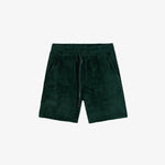 The Teddy Shorts in pine — front view showing the soft teddy texture and drawstring waist
