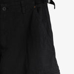 The Monterrey Cargo Pant in black — close-up of the adjustable waist and pocket embroidery