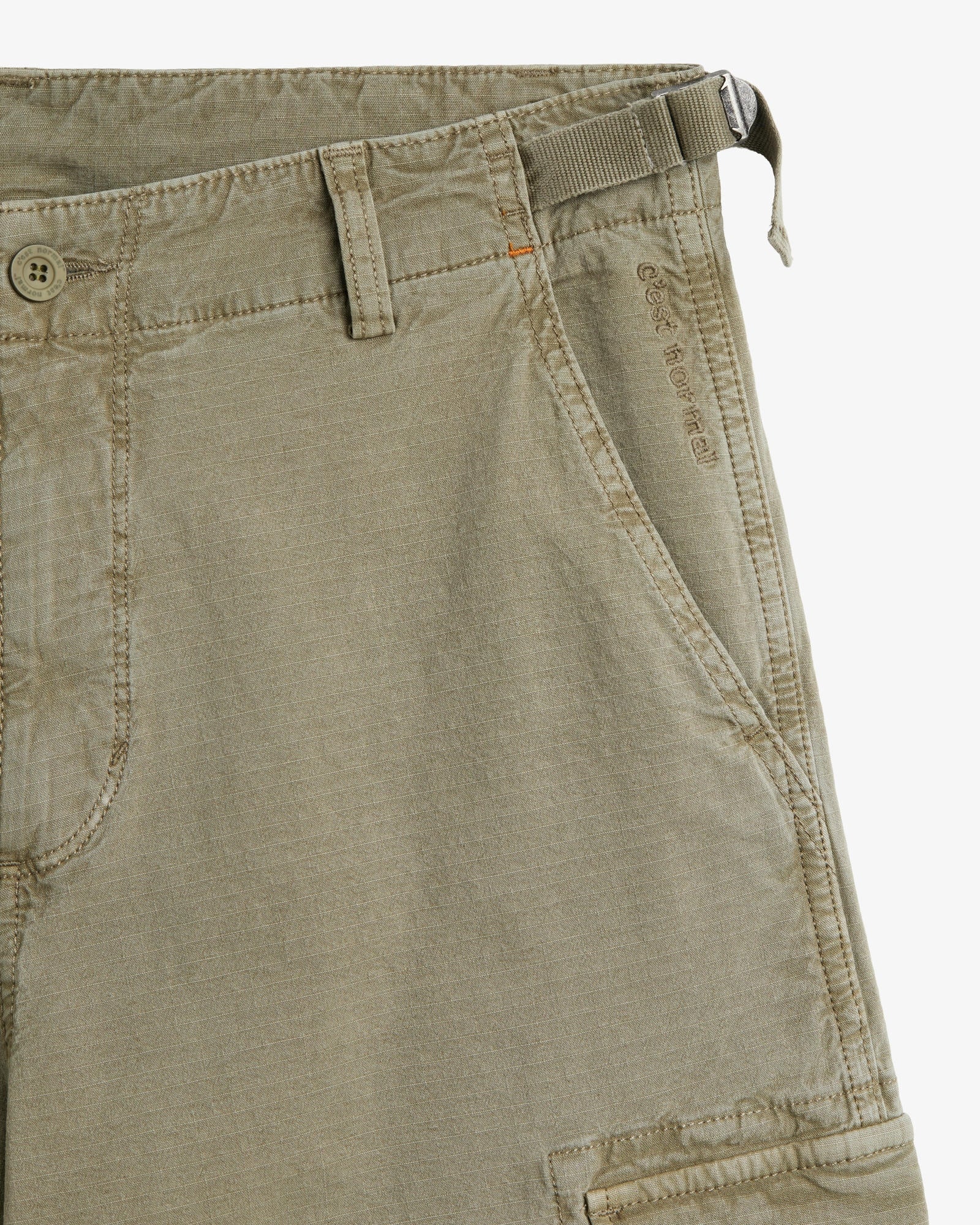 The Monterrey Cargo Pant in Light Khaki — close-up of the adjustable waist and pocket