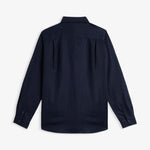 The Daily Linen Shirt in navy — back view showing the pleated back yoke