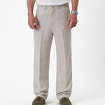 The Daily Linen Trouser in natural — front view showing the straight leg and pressed crease