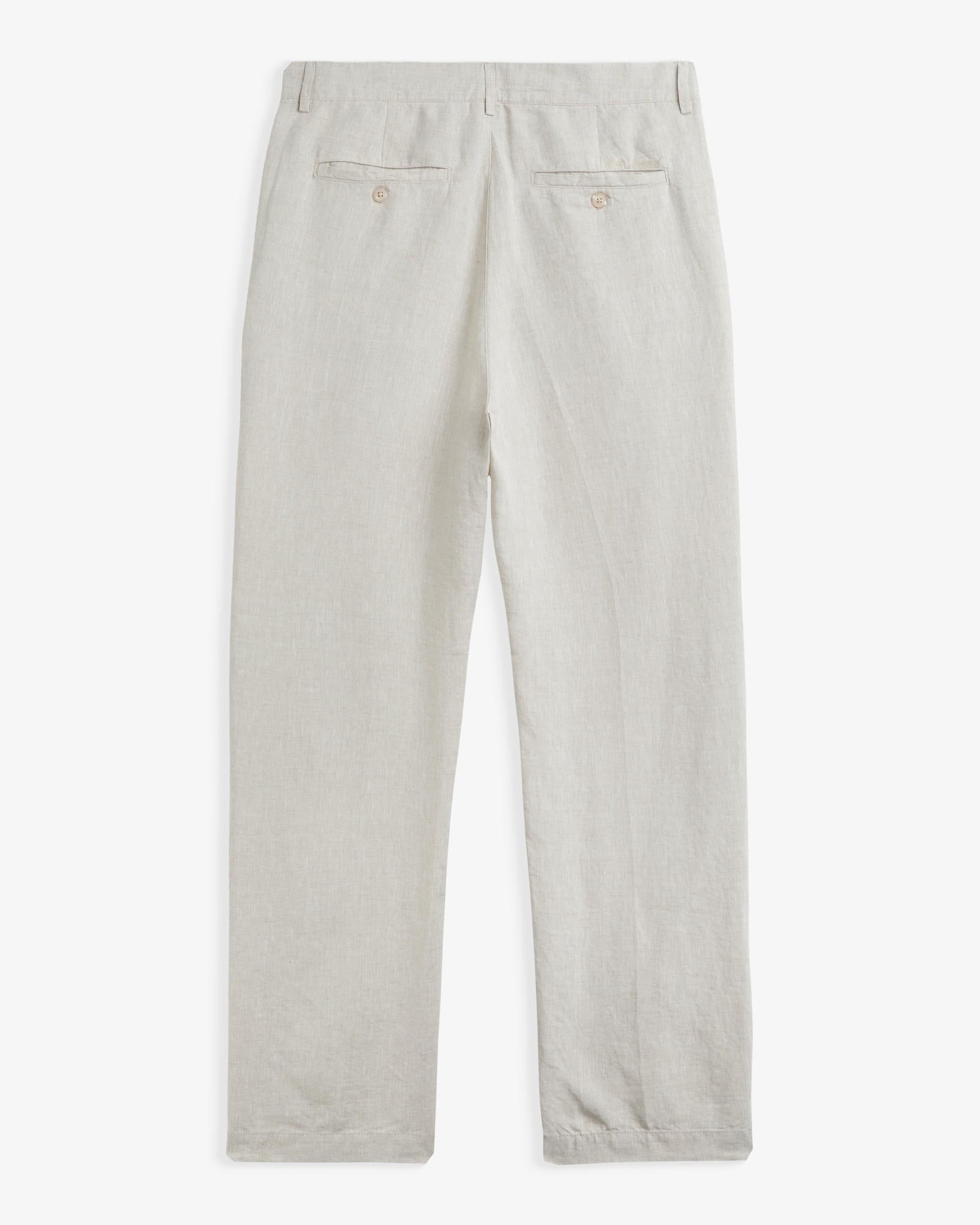 The Daily Linen Trouser in natural — back view with functional welt pockets and button closure