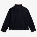 The Denim Jacket in rinse blue — back view showing the dark wash and corduroy collar