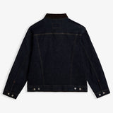 The Denim Jacket in rinse blue — back view showing the dark wash and corduroy collar