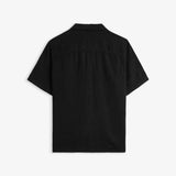The Holiday Linen SS Shirt in black — back view against a white background
