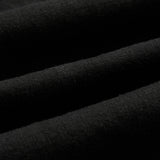 The Holiday Linen SS Shirt in black — close-up showing the breathable linen texture