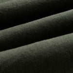 The Holiday Linen SS Shirt in dark khaki — close-up of the textured linen fabric