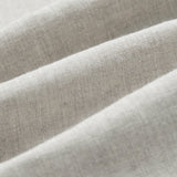 The Holiday Linen SS Shirt in Natural — close-up of the textured fabric weave