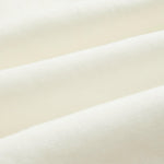 The Holiday Linen SS Shirt in off white — close-up of the breathable linen fabric texture