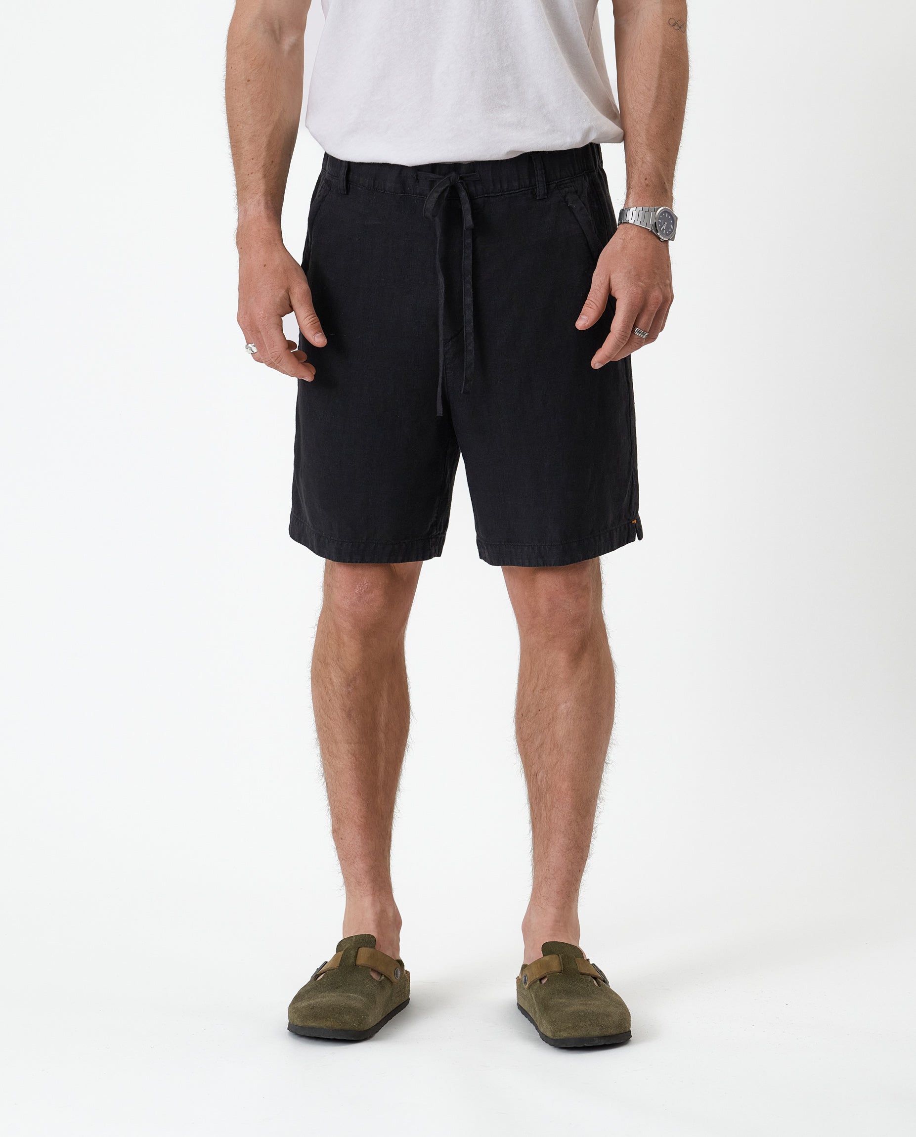 The Holiday Linen Short in black — front view against a white background