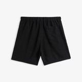 The Holiday Linen Short in black — back view showing the elastic waistband and pocket
